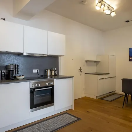 Апартаменты Goldenkey-Suites - Luxury Suite 'Leopold Mozart' - 3 Rooms - Air Conditioning - Prime Location Rathausplatz Augsburg